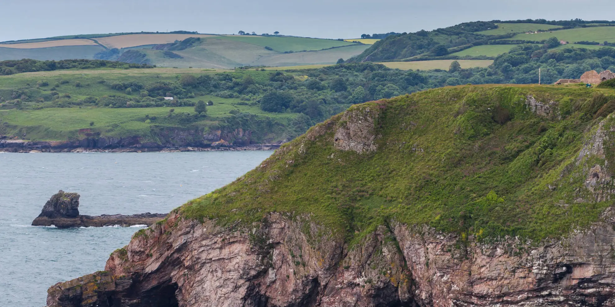 An image depicting the trail Brixham Headlands Walk and its surrounding area.