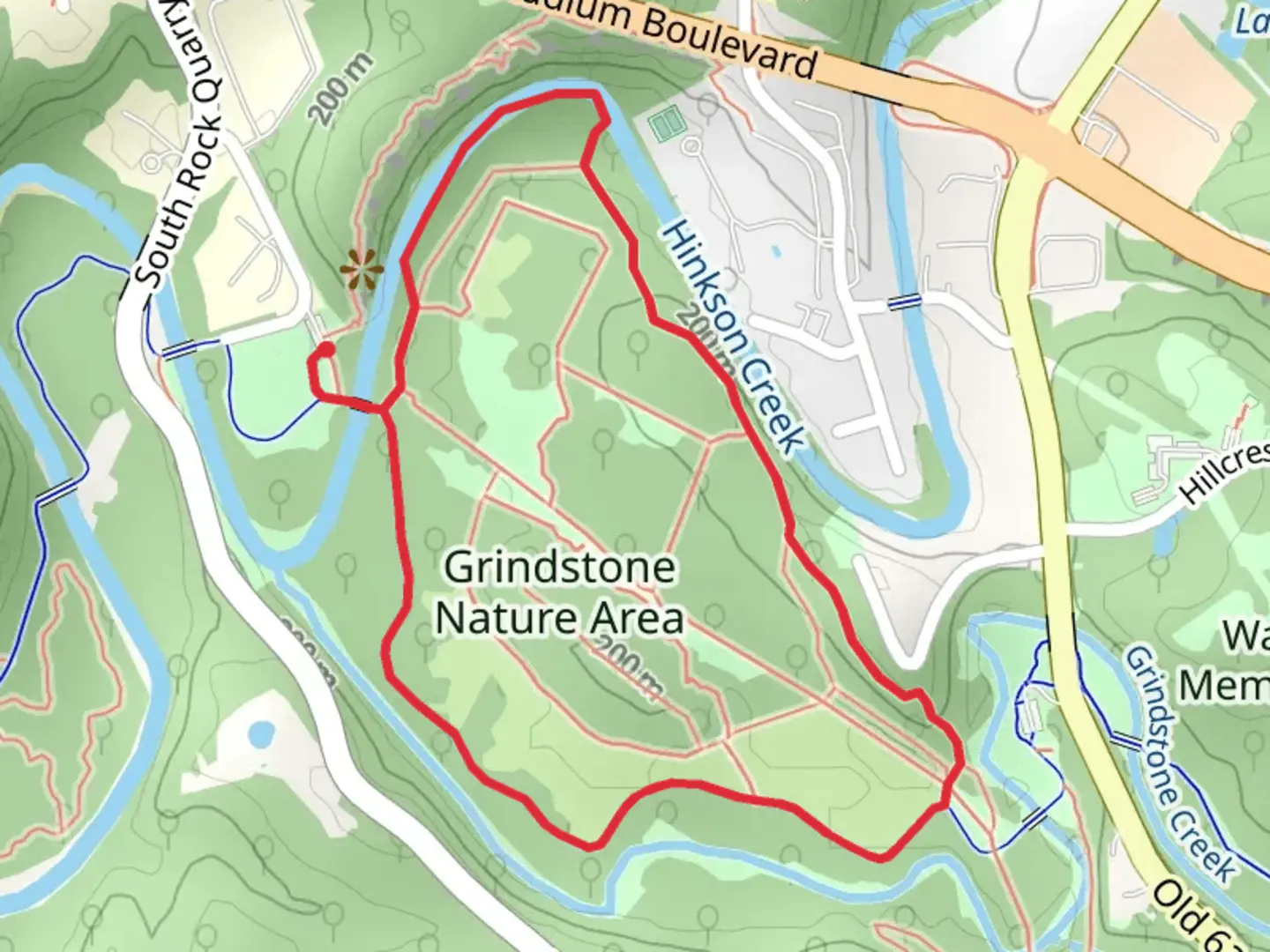 An image depicting the trail Hinkson Creek Loop Trail and its surrounding area.