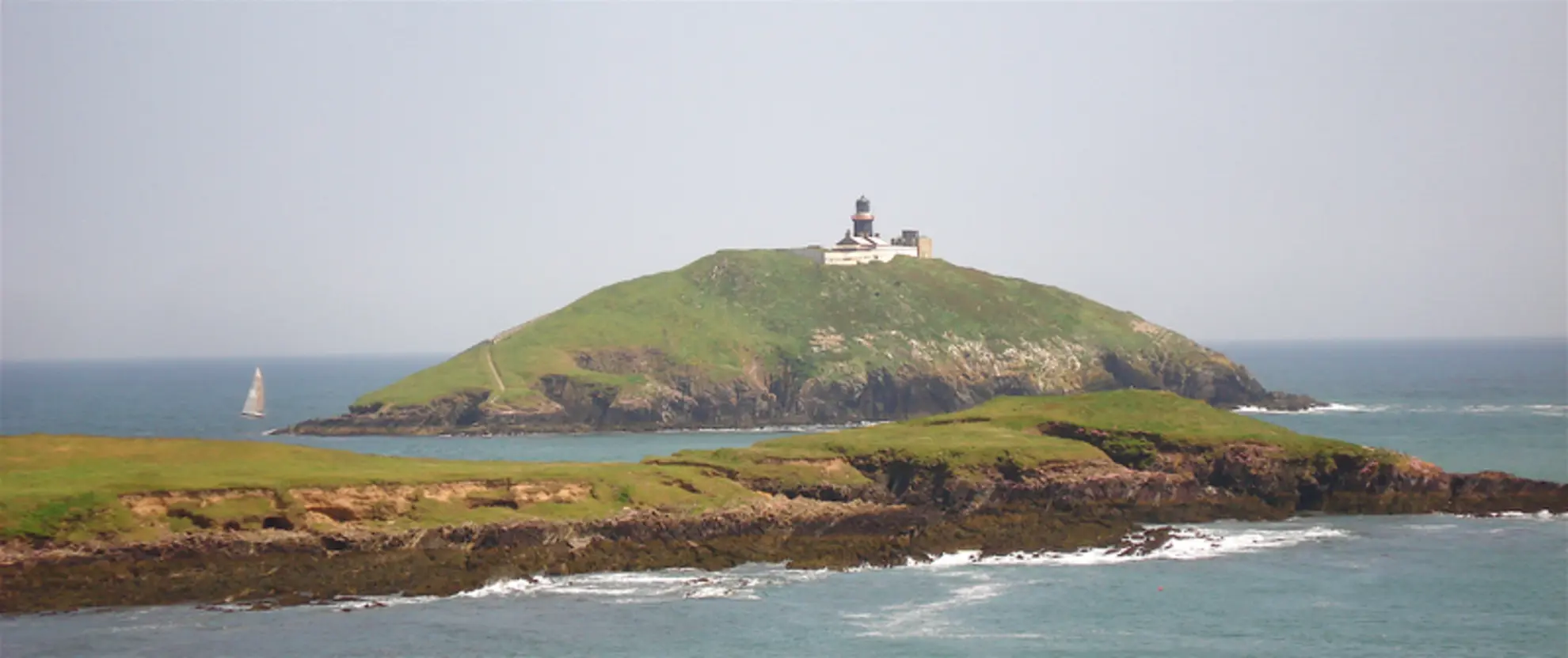 An image depicting the trail Ballycotton Cliffs and its surrounding area.