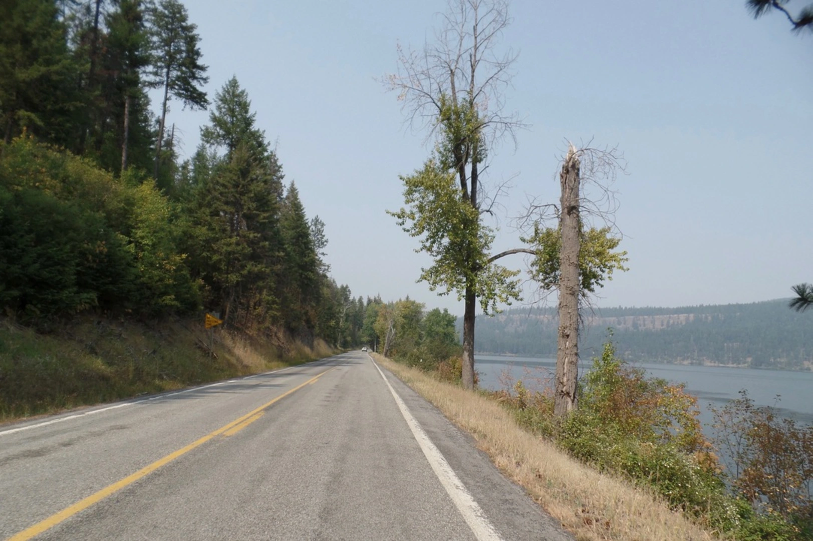 An image depicting the trail Coeur d'Alene Trail and its surrounding area.