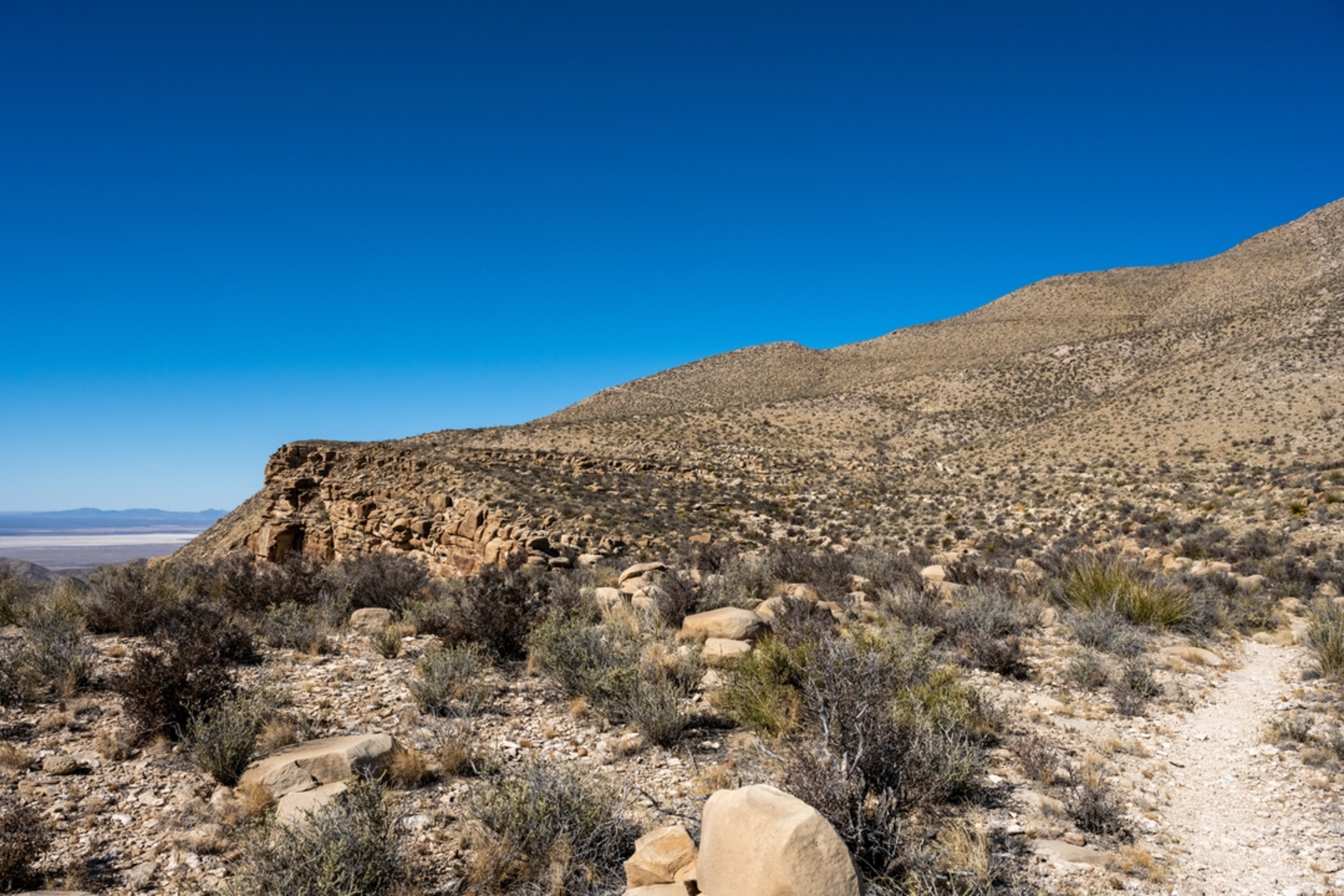 An image depicting the trail Salt Basin Overlook via El Capitan Trail and its surrounding area.