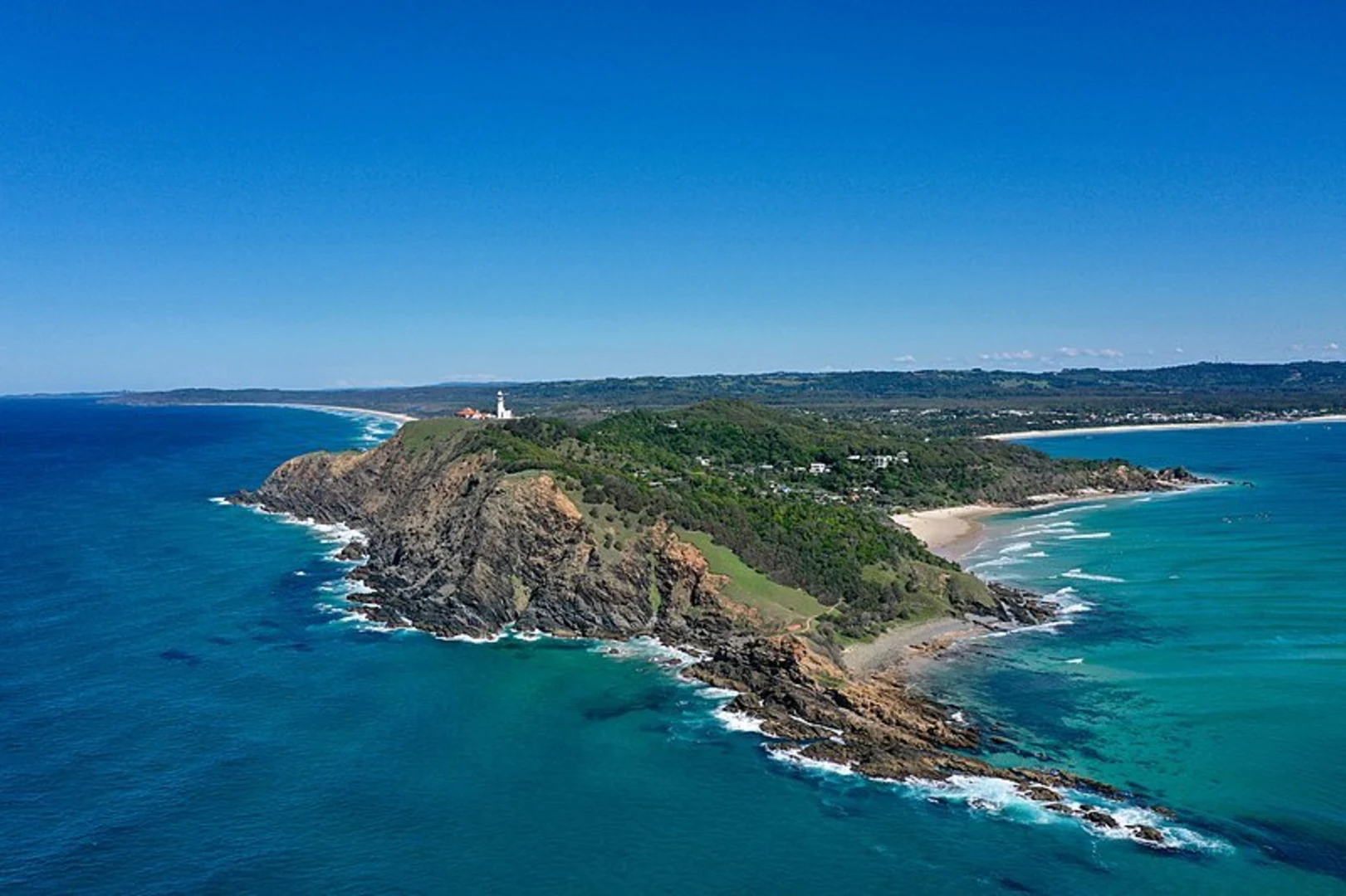 An image depicting the trail Byron Bay Walk and its surrounding area.