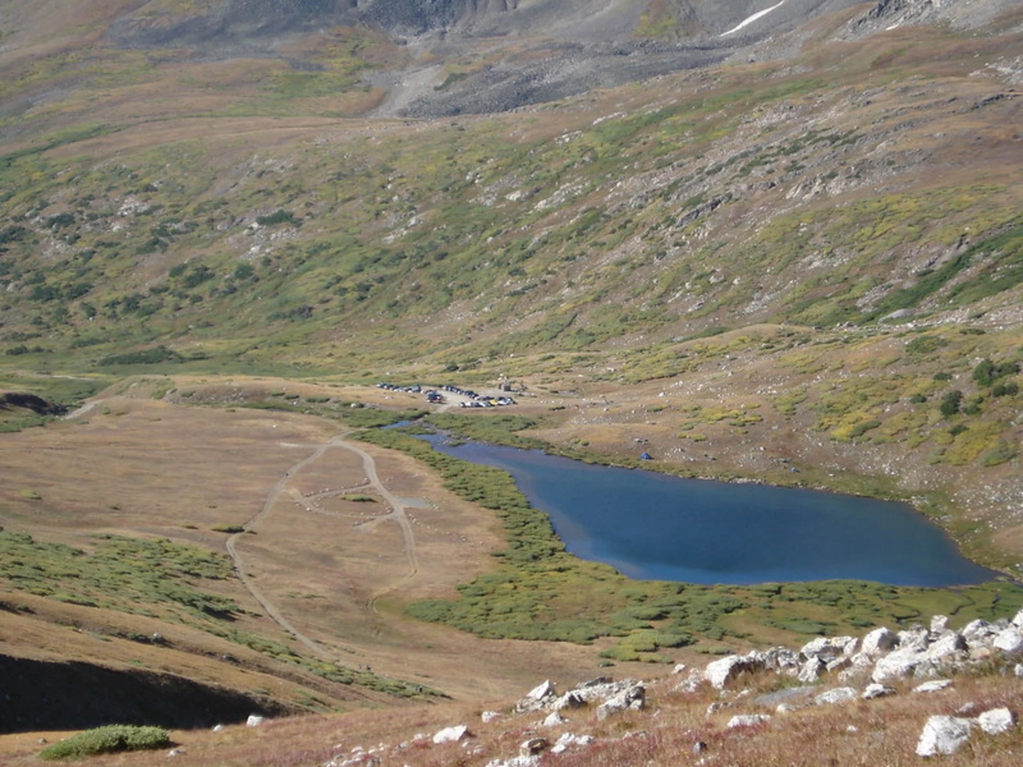 An image depicting the trail Mount Lincoln and Mount Cameron Trail from Kite Lake and its surrounding area.