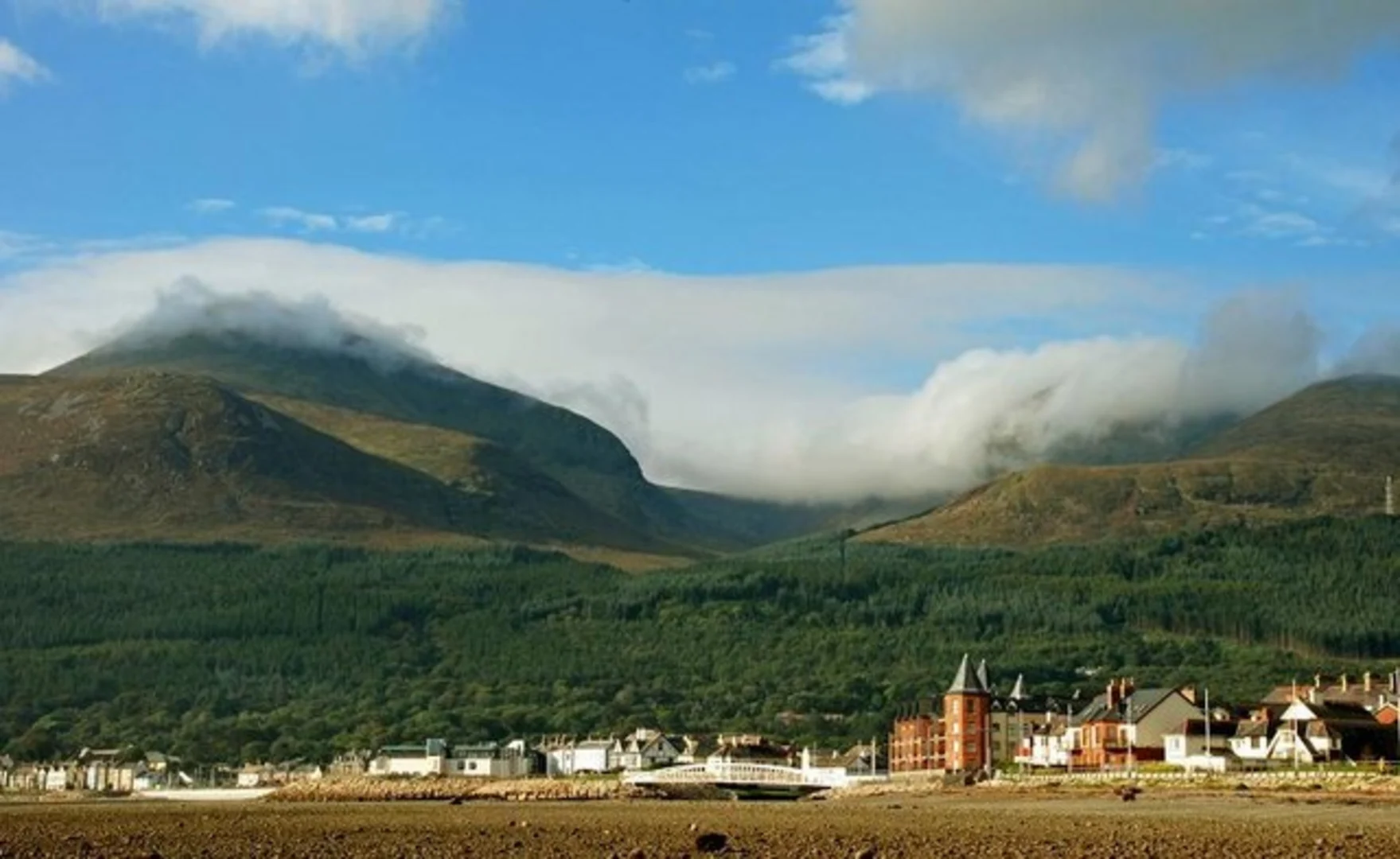 An image depicting the trail Slieve Donard Loop via Glen River and its surrounding area.