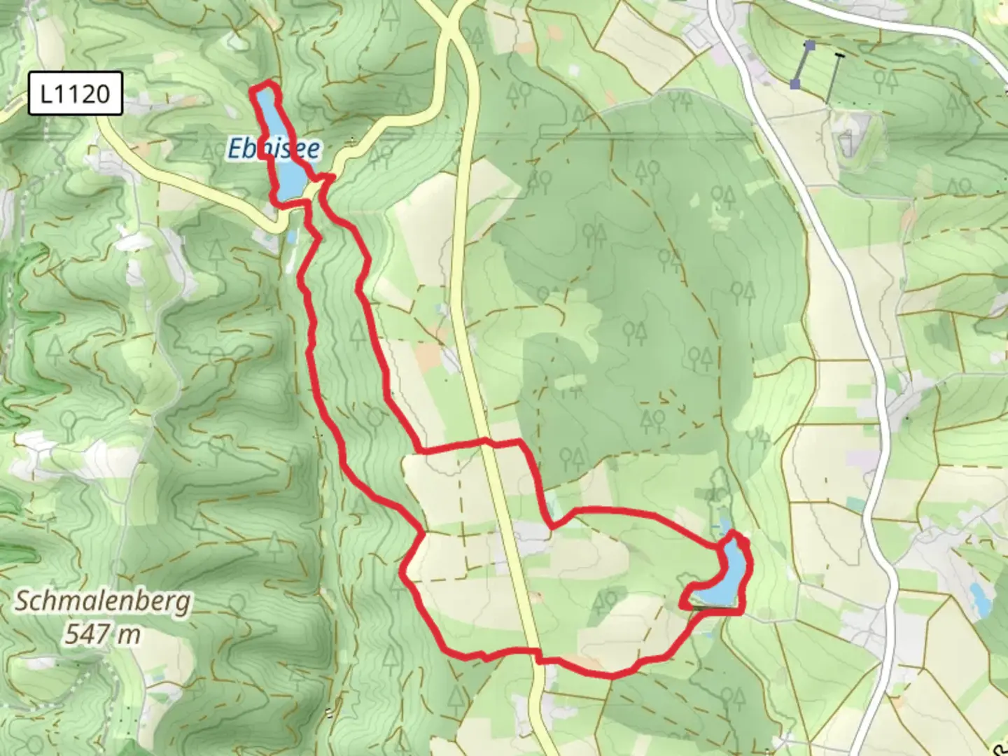 An image depicting the trail Aichstruter Stausee and Ebnisee Loop via Zum Aichstrutsee and its surrounding area.