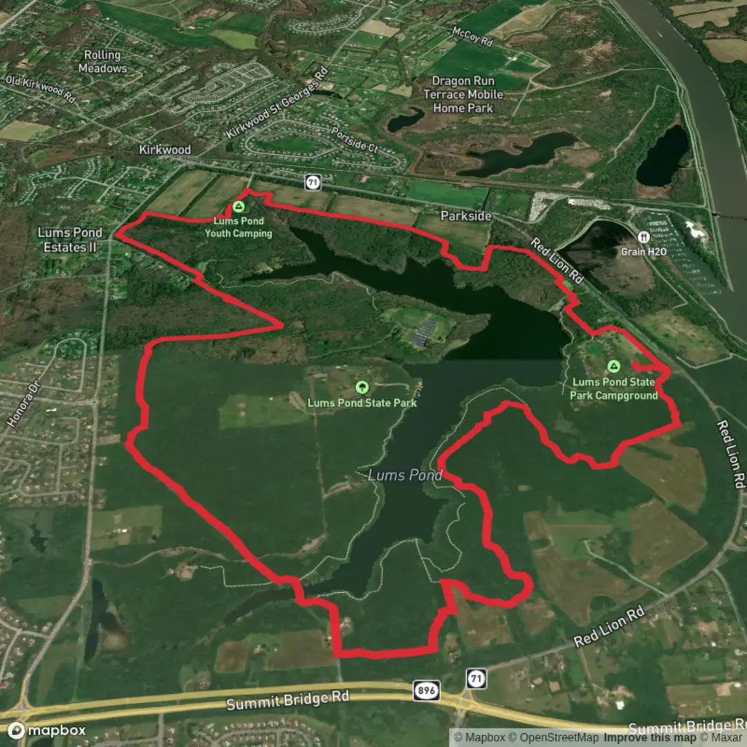An image depicting the trail Lums Pond via Little Jersey Trail and its surrounding area.