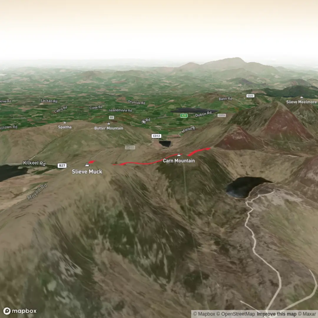 An image depicting the trail Ott Car Park to Slieve Muck via Carn and its surrounding area.