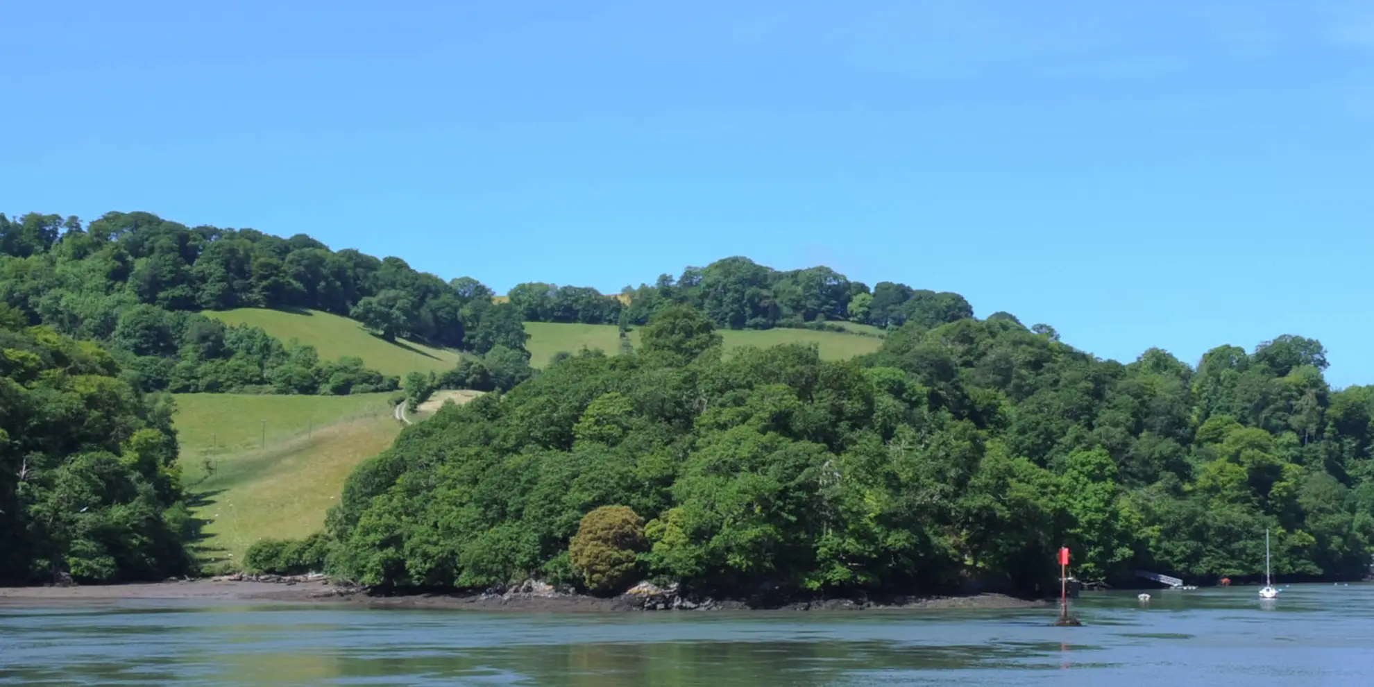 An image depicting the trail Galmpton to Greenway Walk via Coombe Lane and its surrounding area.