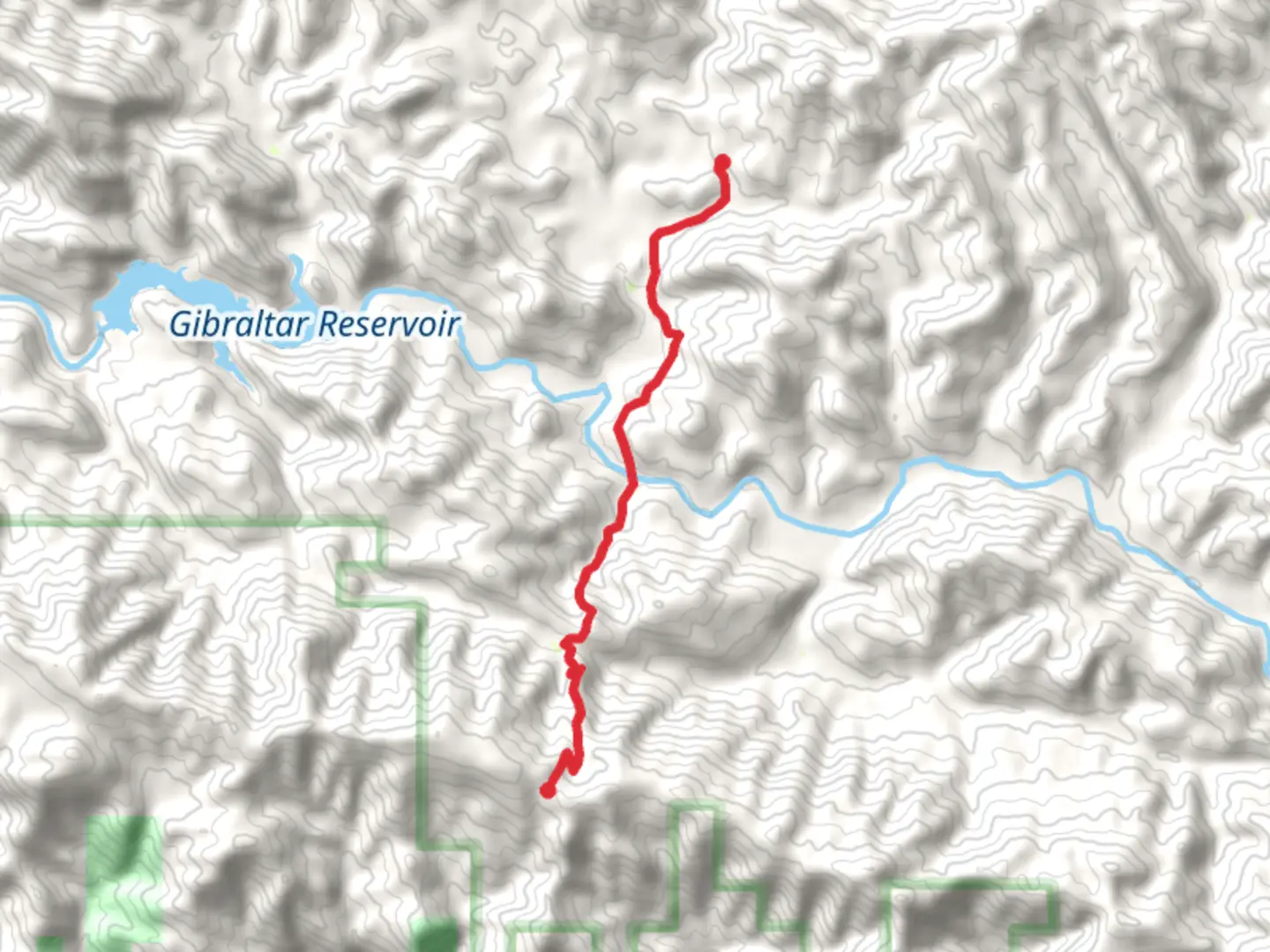 An image depicting the trail Mono Alamar Trail via Cold Spring Saddle and its surrounding area.