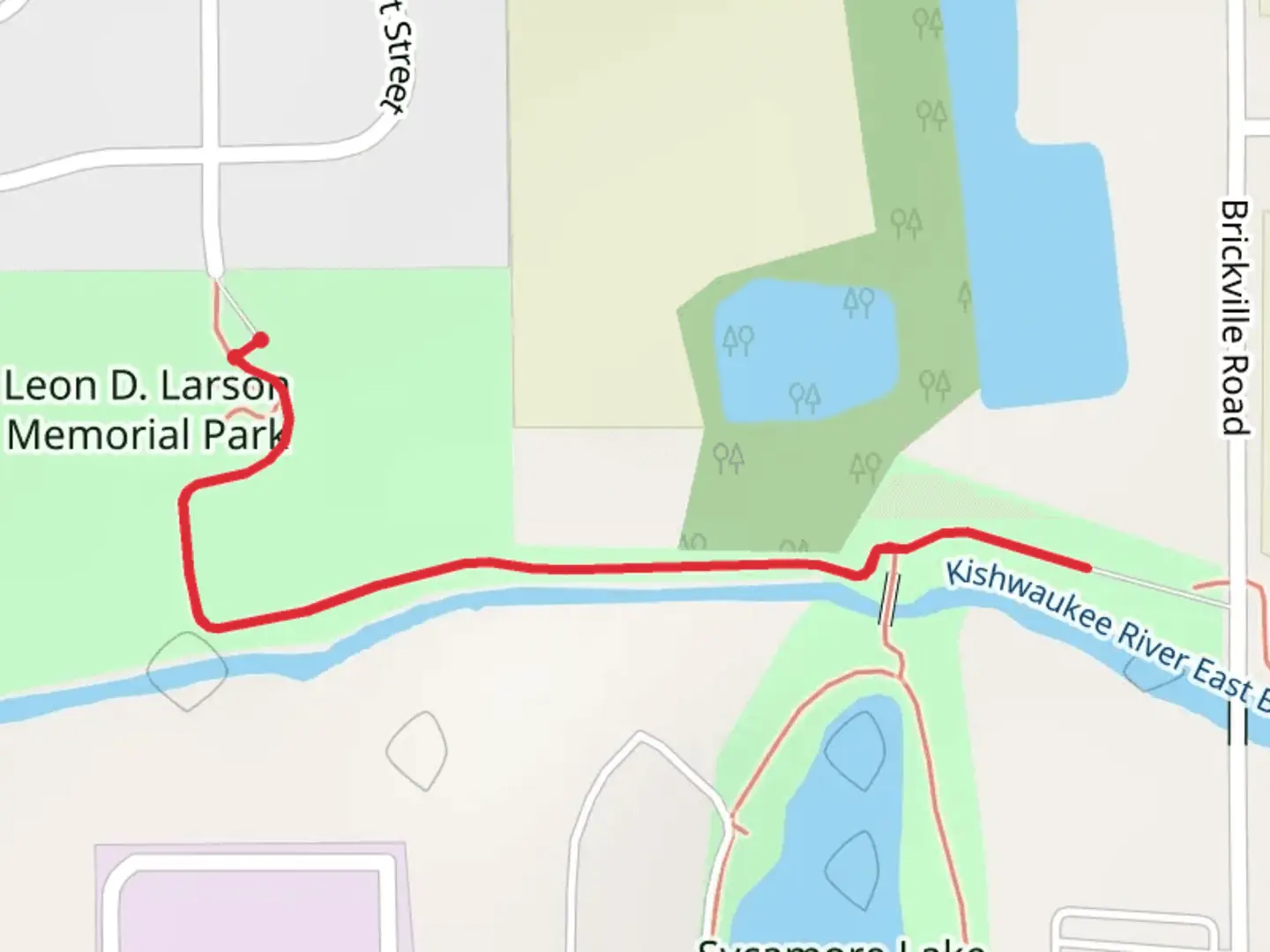 An image depicting the trail Leon D Larson Memorial Park and its surrounding area.