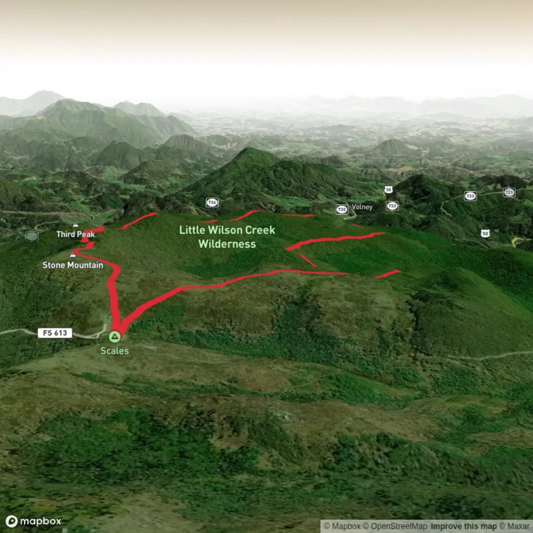 An image depicting the trail Stone Mountain via First Peak Trail and Big Wilson Creek Trail and its surrounding area.
