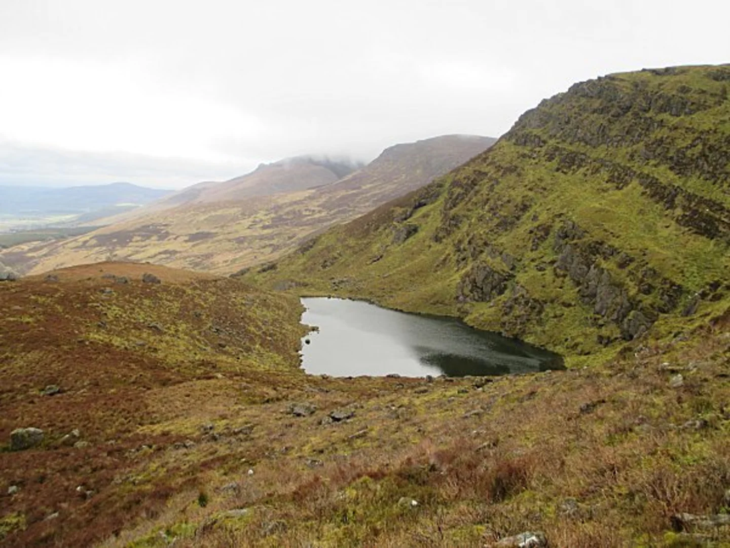 An image depicting the trail Knockanaffrin South Top and its surrounding area.