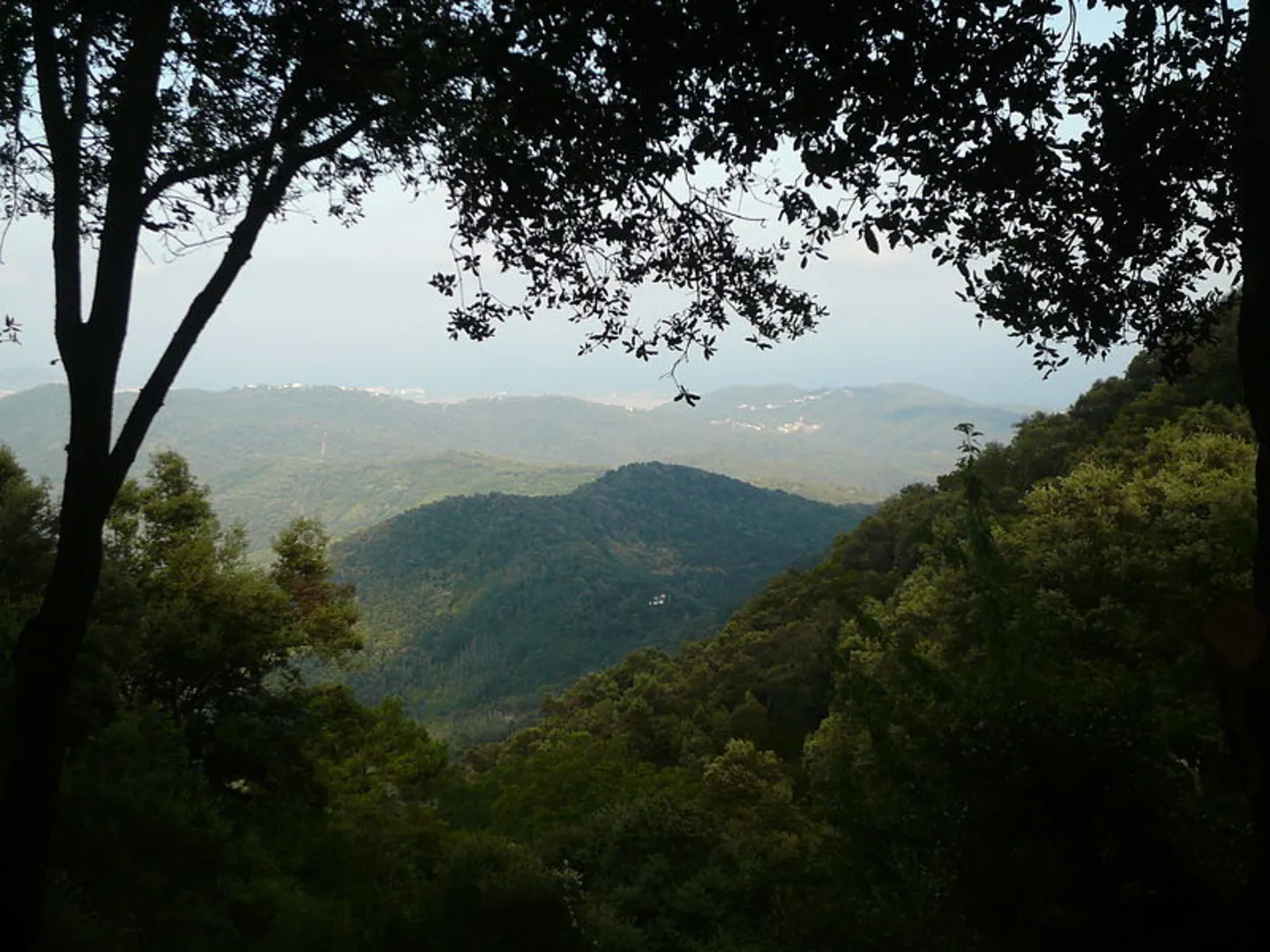 An image depicting the trail Hermitage of L'Erola SL C 78 and its surrounding area.
