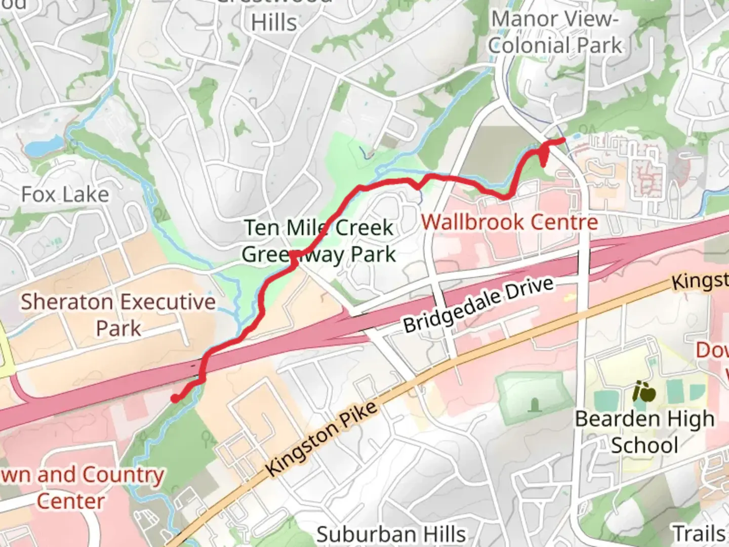 An image depicting the trail Ten Mile Creek Greenway and its surrounding area.