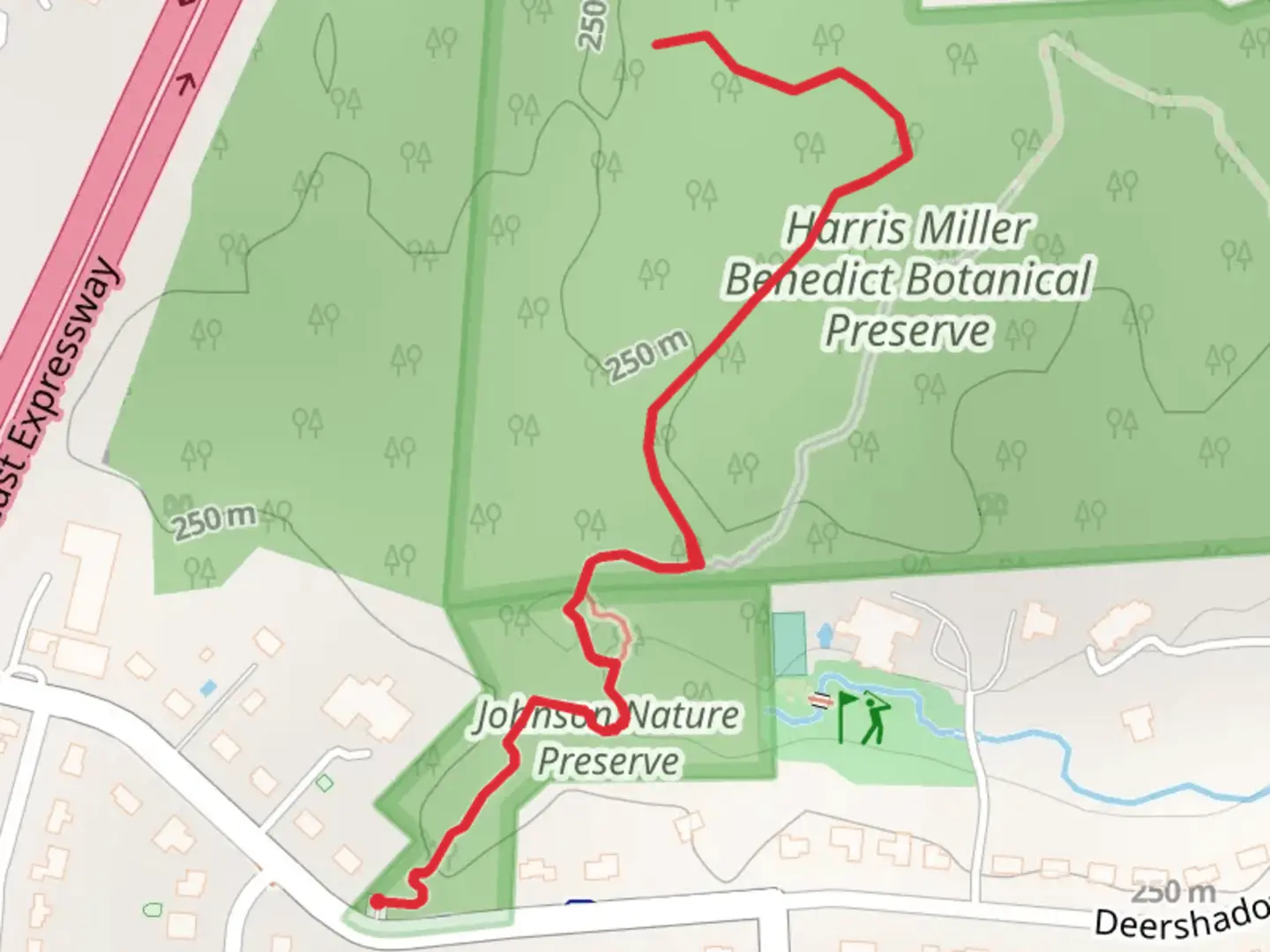 An image depicting the trail Harris Miller Benedict Botanical Preserve and its surrounding area.