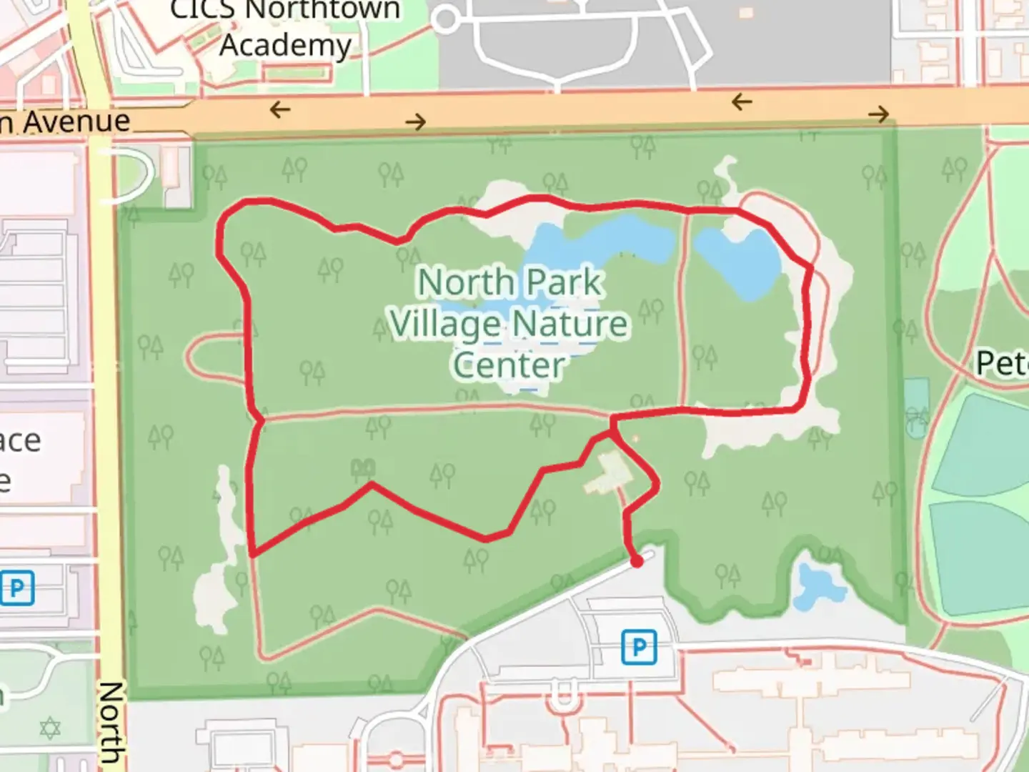 An image depicting the trail North Park Village Nature Center Loop and its surrounding area.
