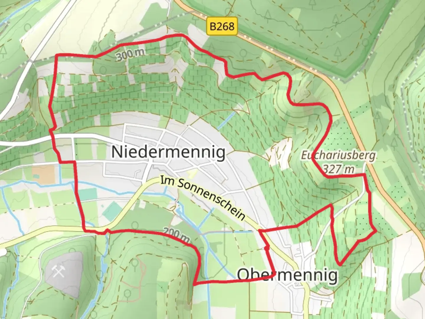 An image depicting the trail Niedermennig Loop via Euchariusberg and its surrounding area.