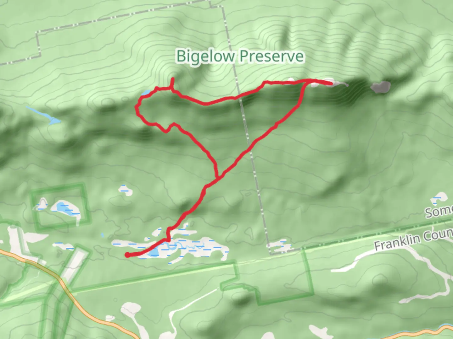 An image depicting the trail Myron H Avery Peak and North Peak Loop via Fire Wardens Trail and its surrounding area.