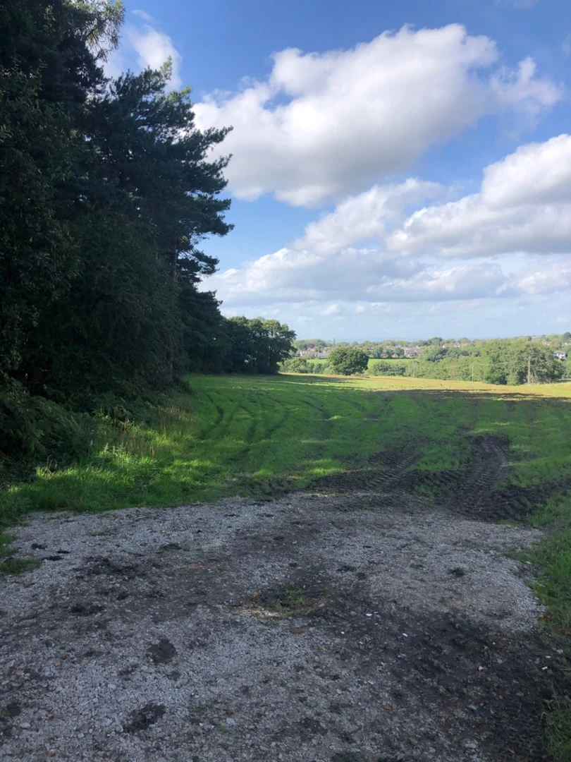 An image depicting the trail Higher Poynton to Lyme Park Circular Walk and its surrounding area.