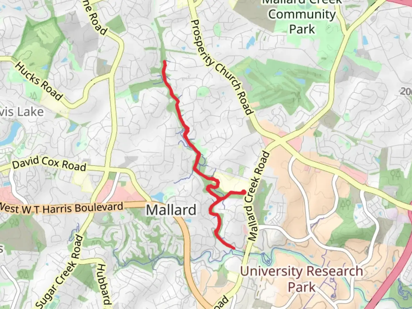 An image depicting the trail Clarks Creek Greenway and its surrounding area.