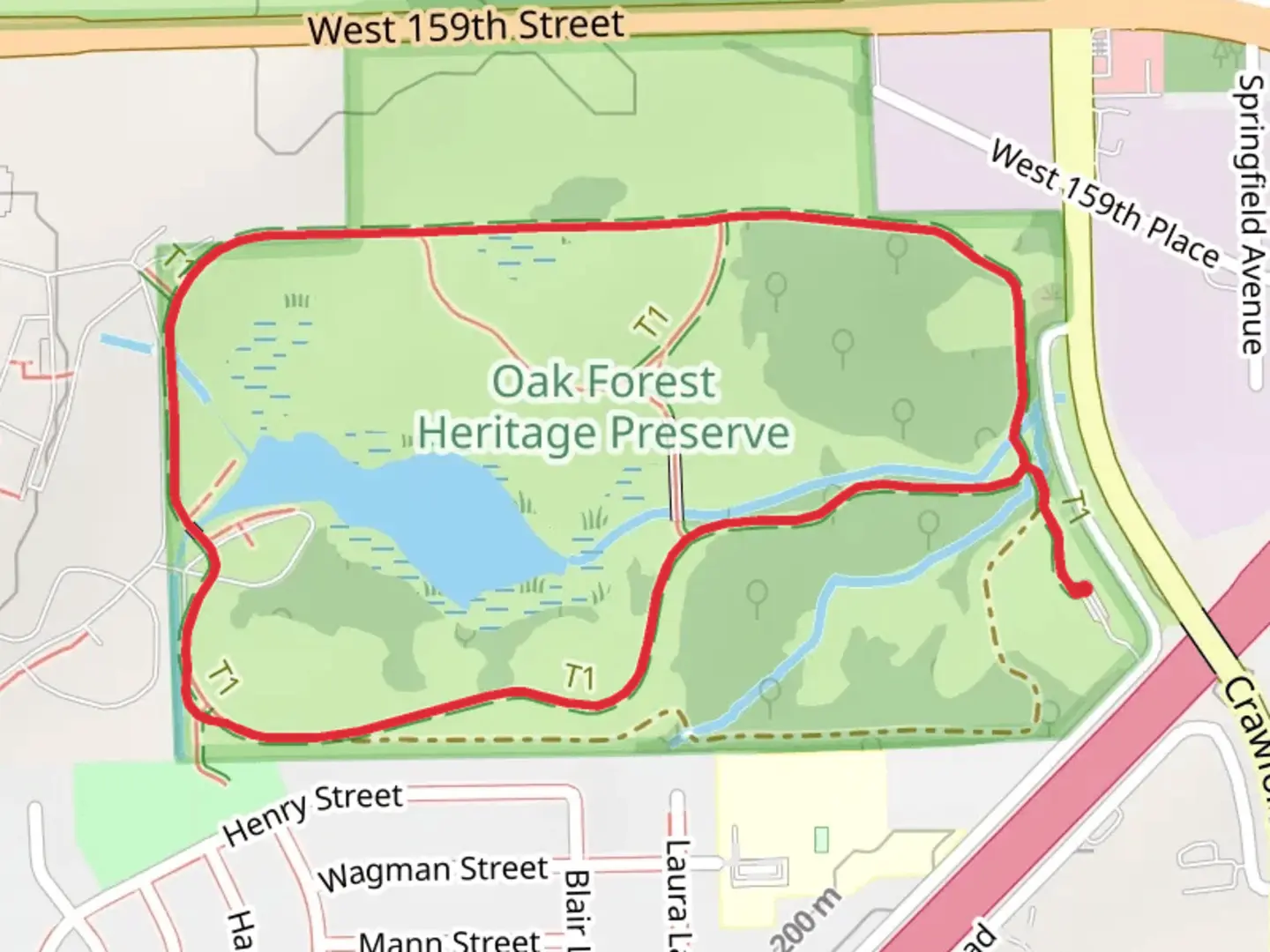 An image depicting the trail Oak Forest Heritage Preserve Brown Paved Loop and its surrounding area.