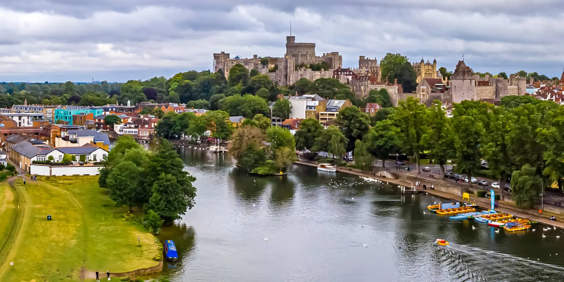 An image depicting the trail Staines to Windsor along the River Thames and its surrounding area.