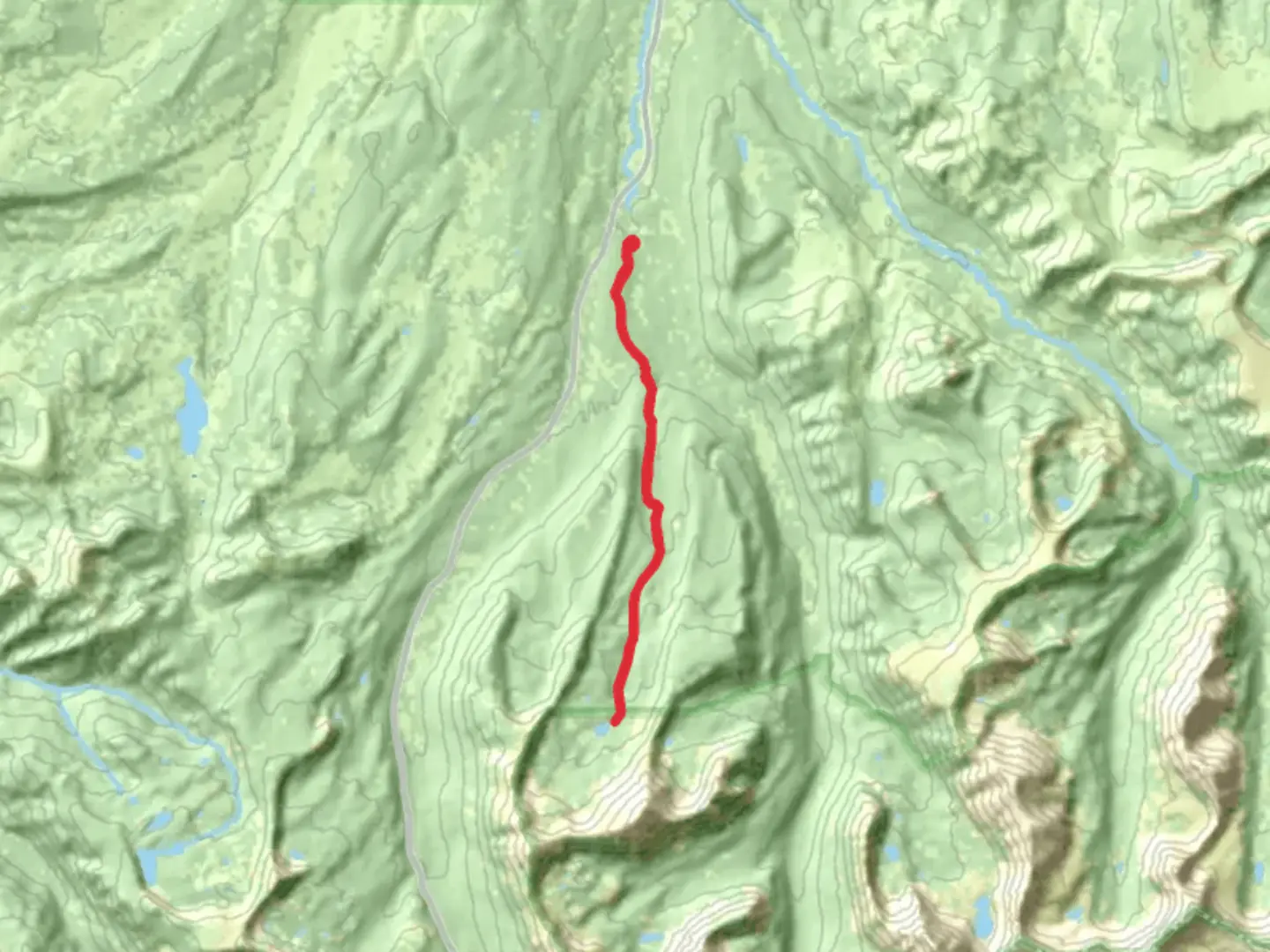 An image depicting the trail Hell Hole Lake and its surrounding area.