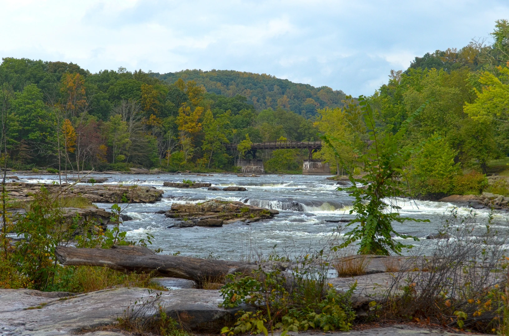An image depicting the trail Ohiopyle Borough Loop Trail and its surrounding area.