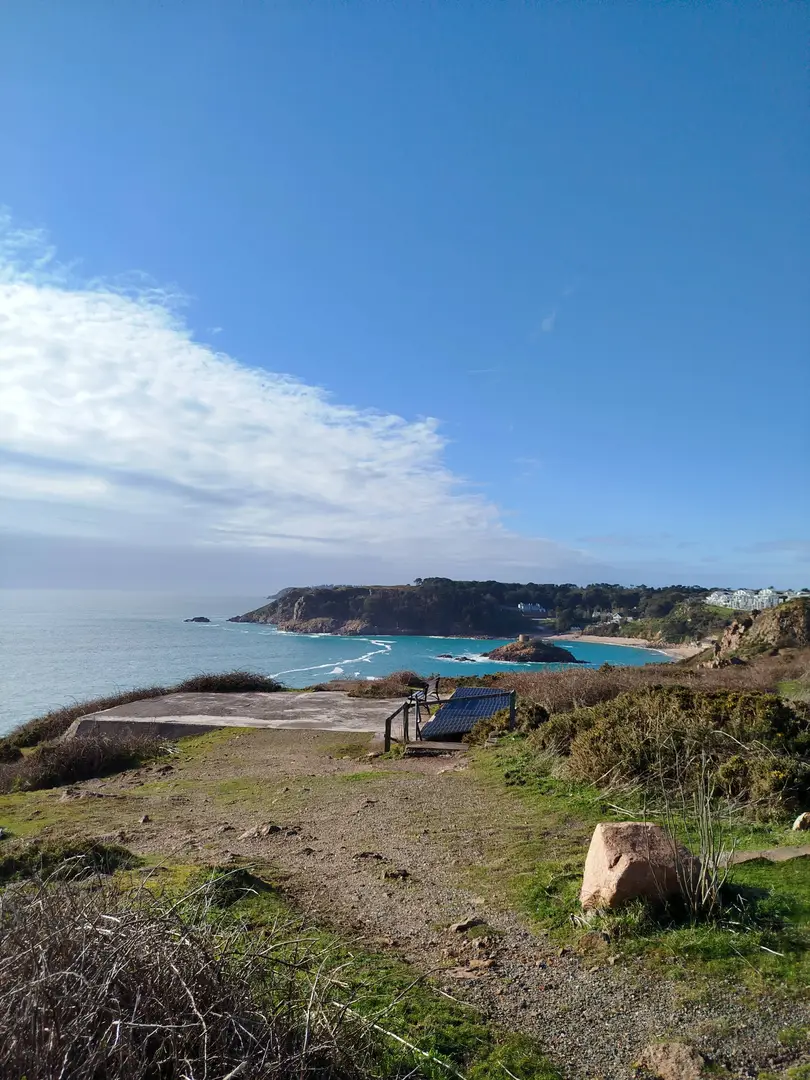 An image depicting the trail Jersey Coastal Path and its surrounding area.