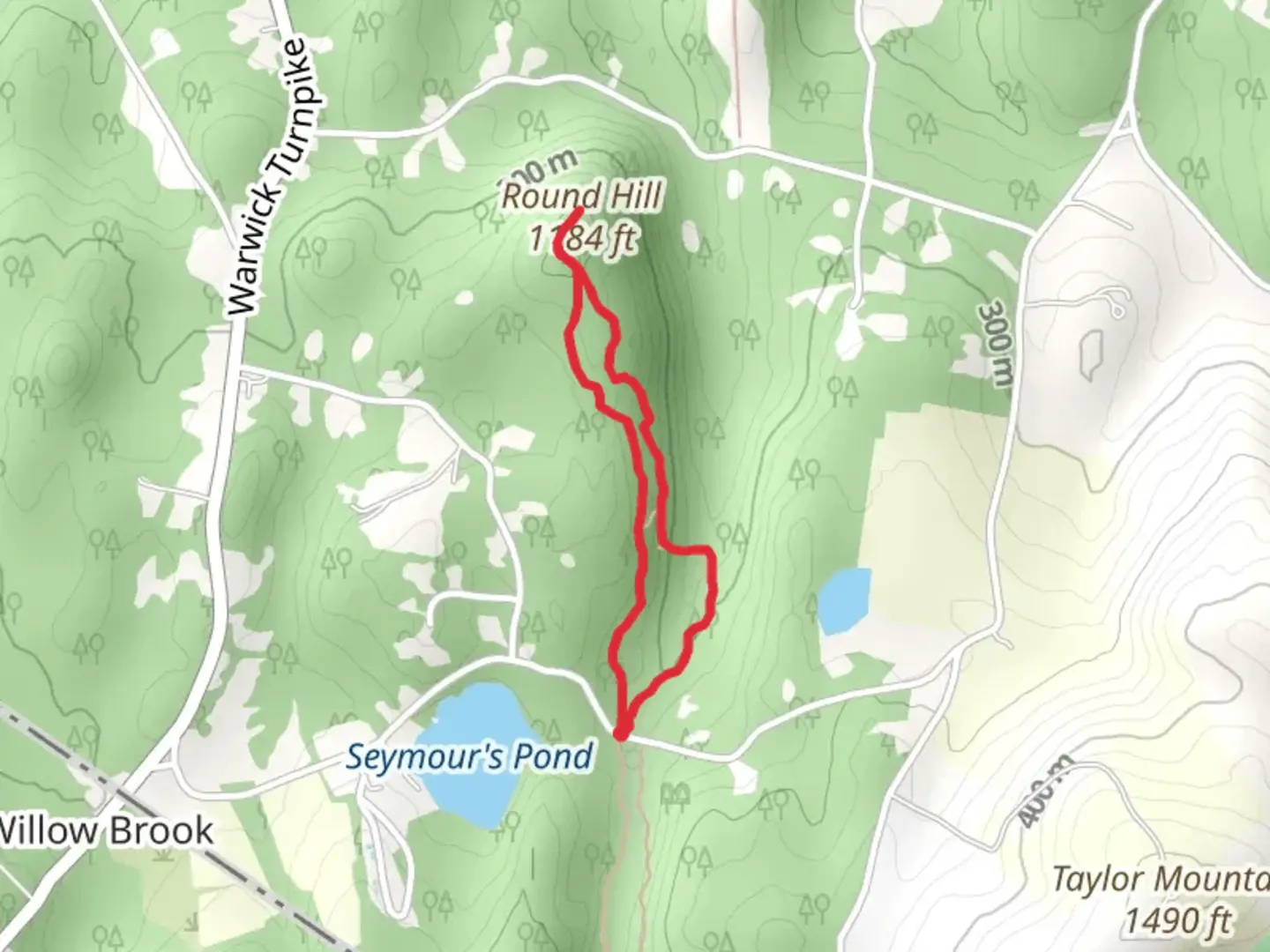 An image depicting the trail Round Hill Loop from Bowen Road and its surrounding area.