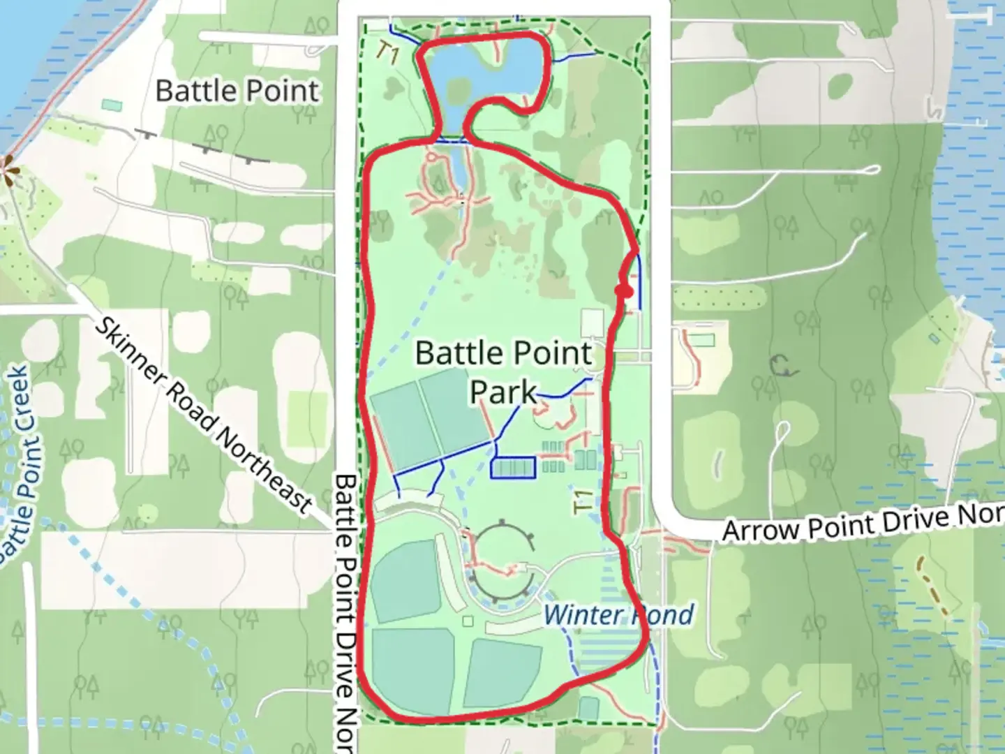 An image depicting the trail Battle Point Park Trail and its surrounding area.