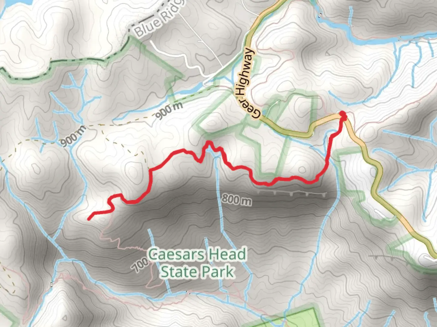 An image depicting the trail Raven Cliff Falls Trail and its surrounding area.