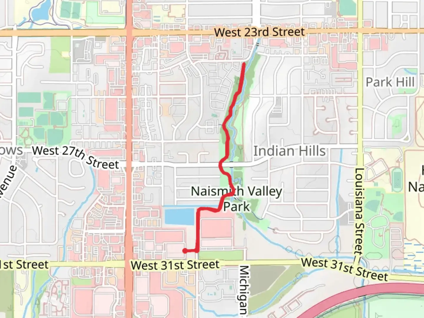 An image depicting the trail Walk beside Naismith Creek and its surrounding area.