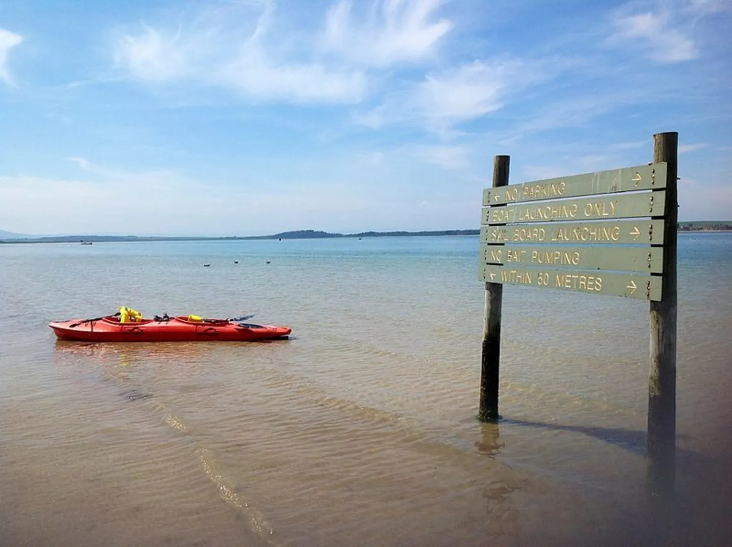 An image depicting the trail Shallow Inlet to Sandy Point Beach Walk and its surrounding area.