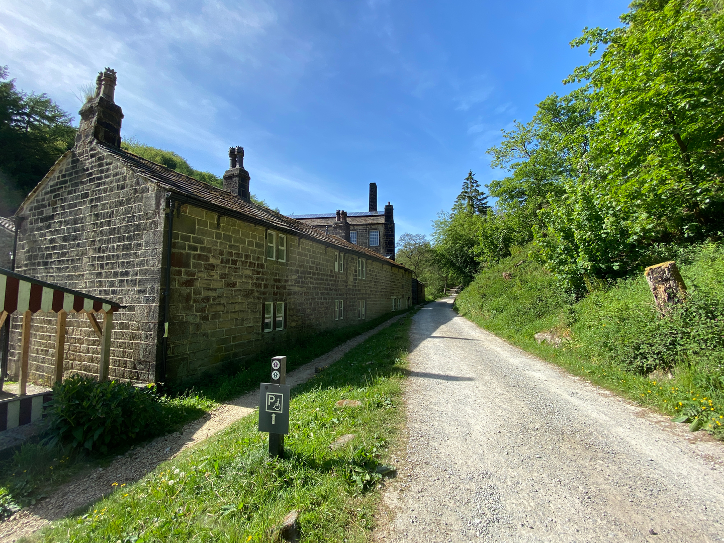 An image depicting the trail Mill Walk at Hardcastle Crags and its surrounding area.