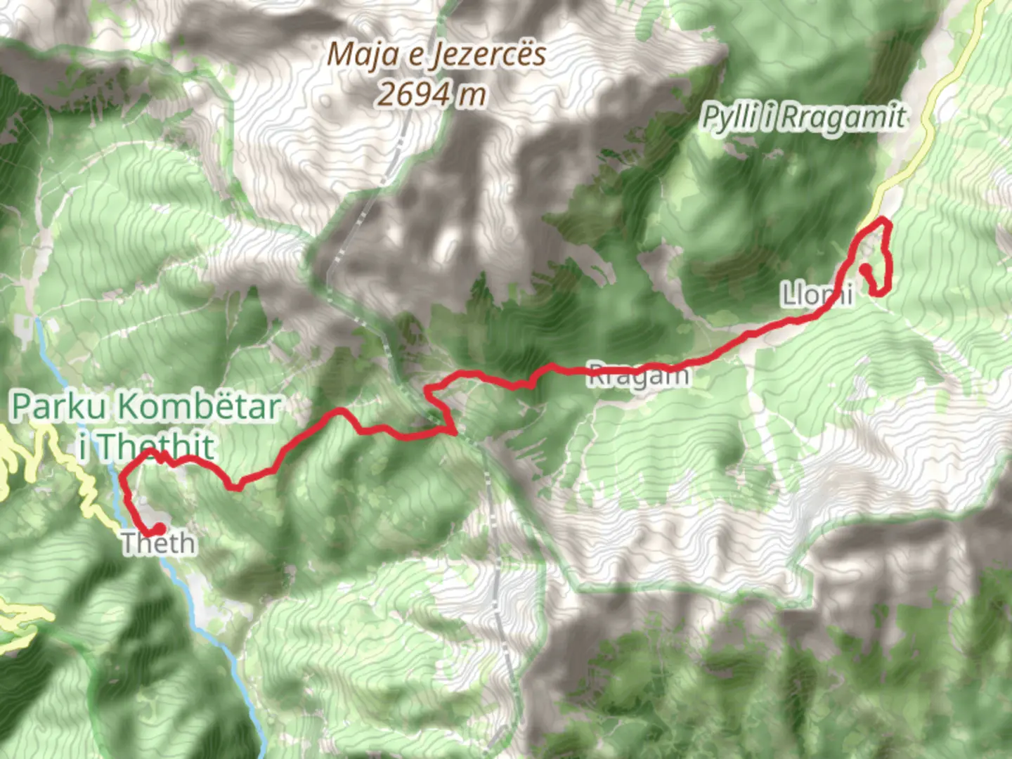 An image depicting the trail Valbona - Theth Albania and its surrounding area.