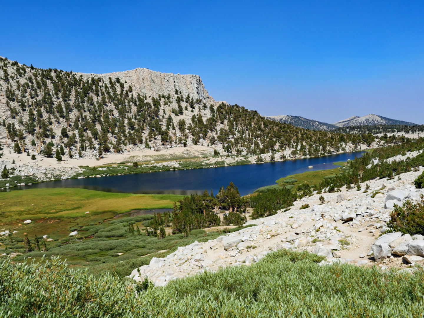 An image depicting the trail Muir Lake via Cottonwood Lakes Trail and its surrounding area.