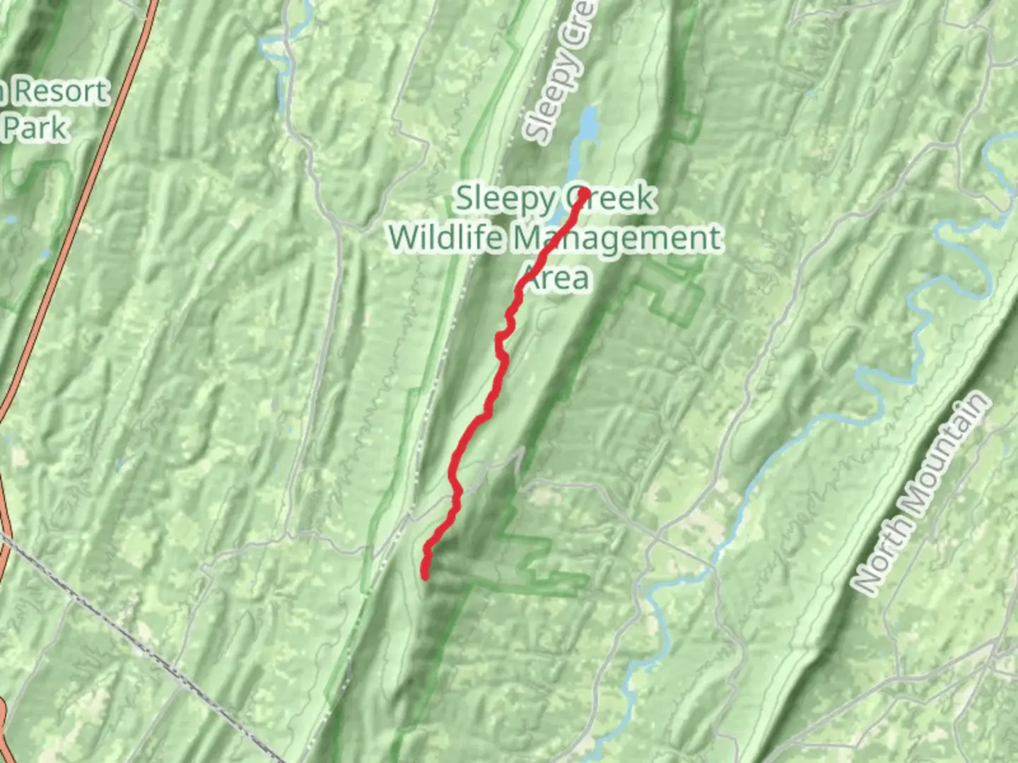 An image depicting the trail Tuscarora Trail from Sleepy Creek Lake and its surrounding area.