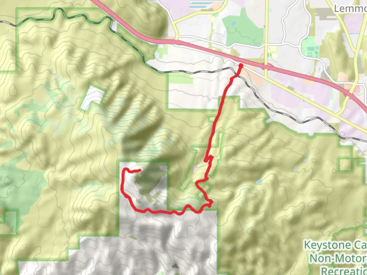 An image depicting the trail Peavine Peak from North Virginia Street and its surrounding area.