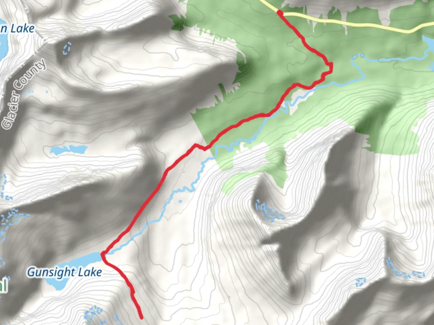 An image depicting the trail Gunsight Lake and Gunsight Pass Trail and its surrounding area.