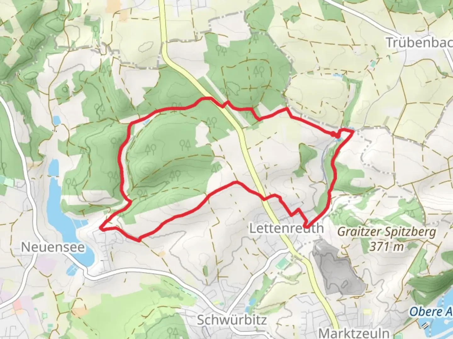 An image depicting the trail Wildhuegelweg and its surrounding area.