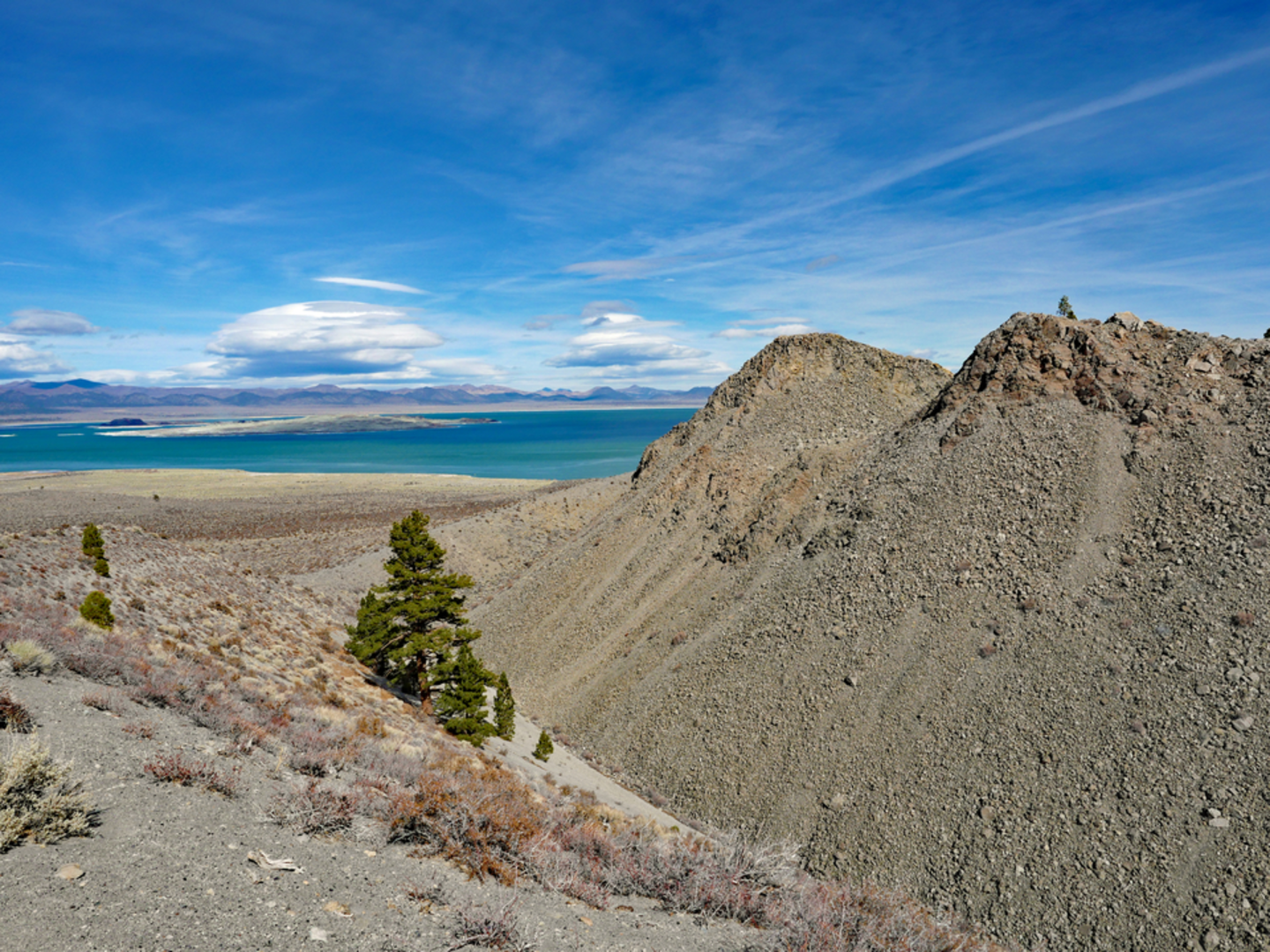 An image depicting the trail Panum Crater Outer Rim Trail and its surrounding area.