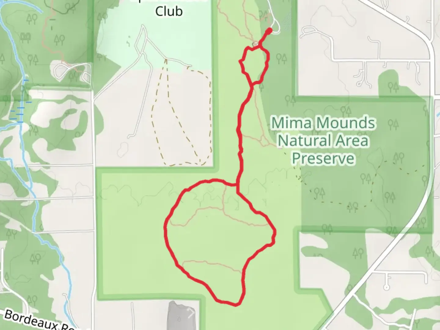 An image depicting the trail Mima Mounds Natural Area Preserve Loop and its surrounding area.