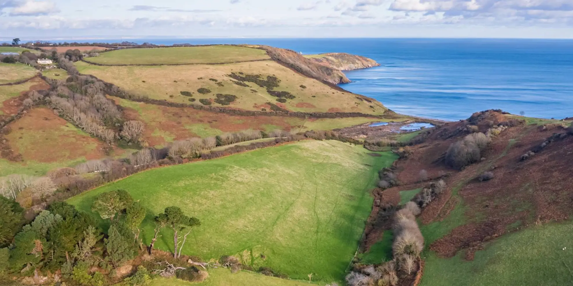 An image depicting the trail Coastal Circular Walk from Woodhuish and its surrounding area.