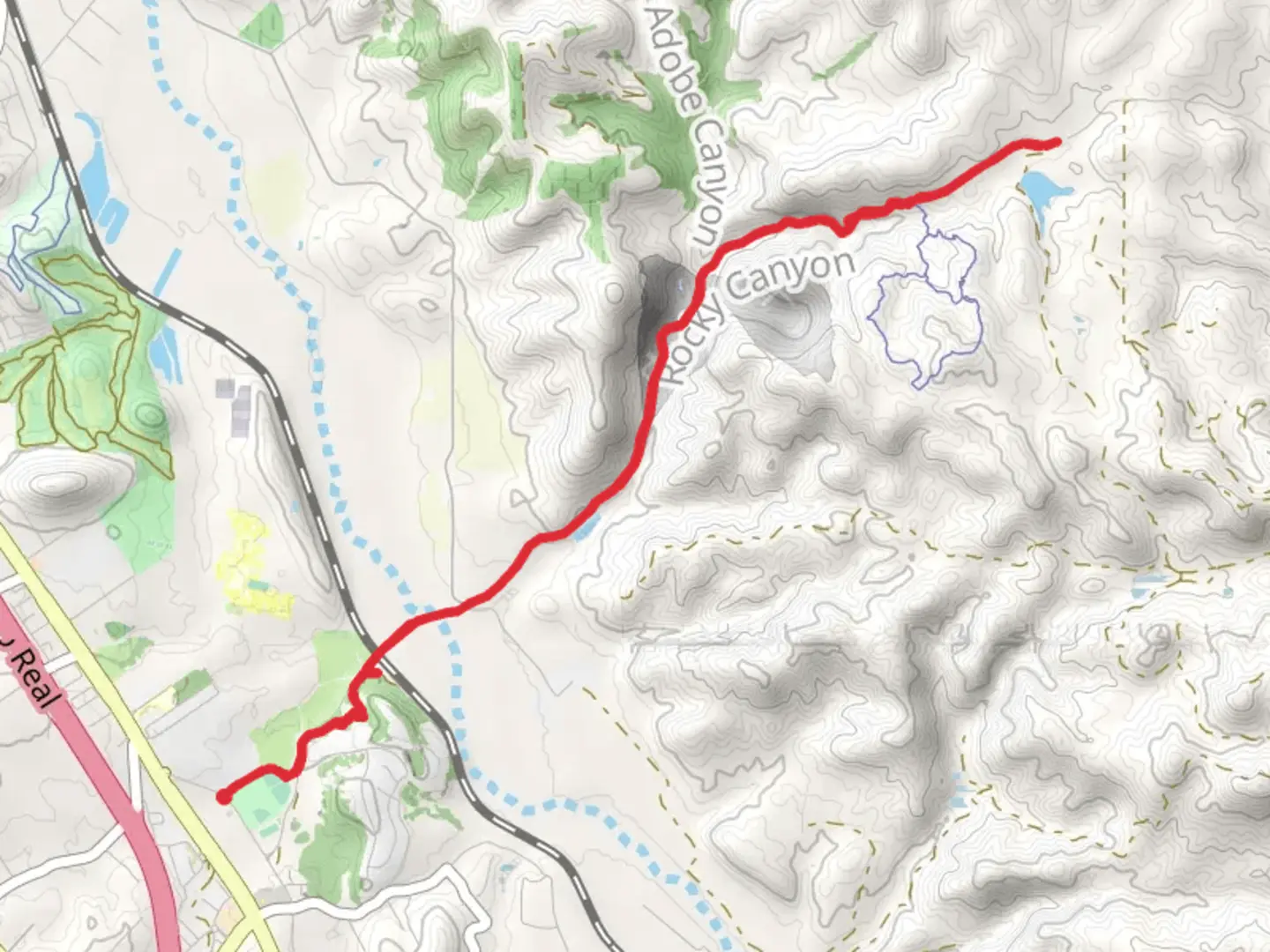 An image depicting the trail Rocky Canyon Road and its surrounding area.