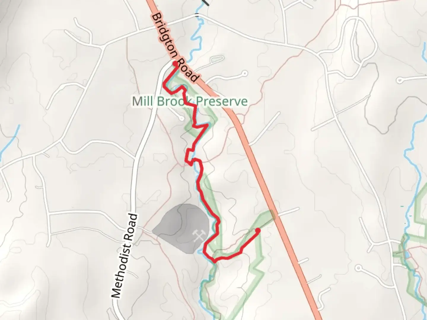 An image depicting the trail Mill Brook- Borrow Pit and its surrounding area.