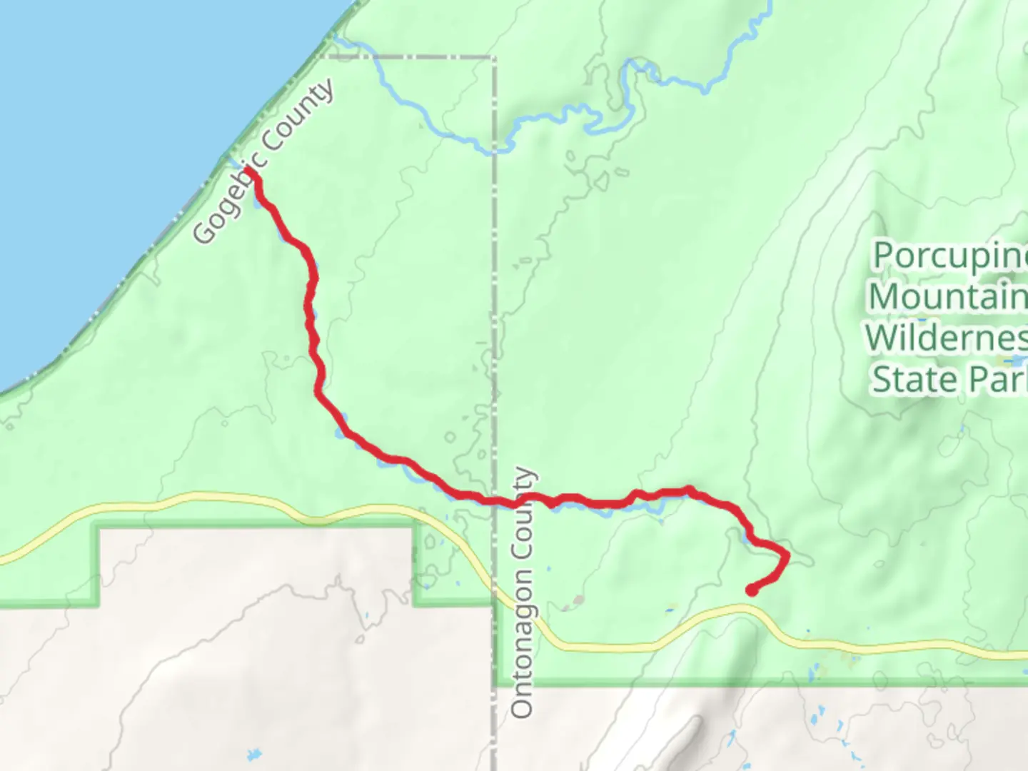 An image depicting the trail Little Carp River via NCT and its surrounding area.