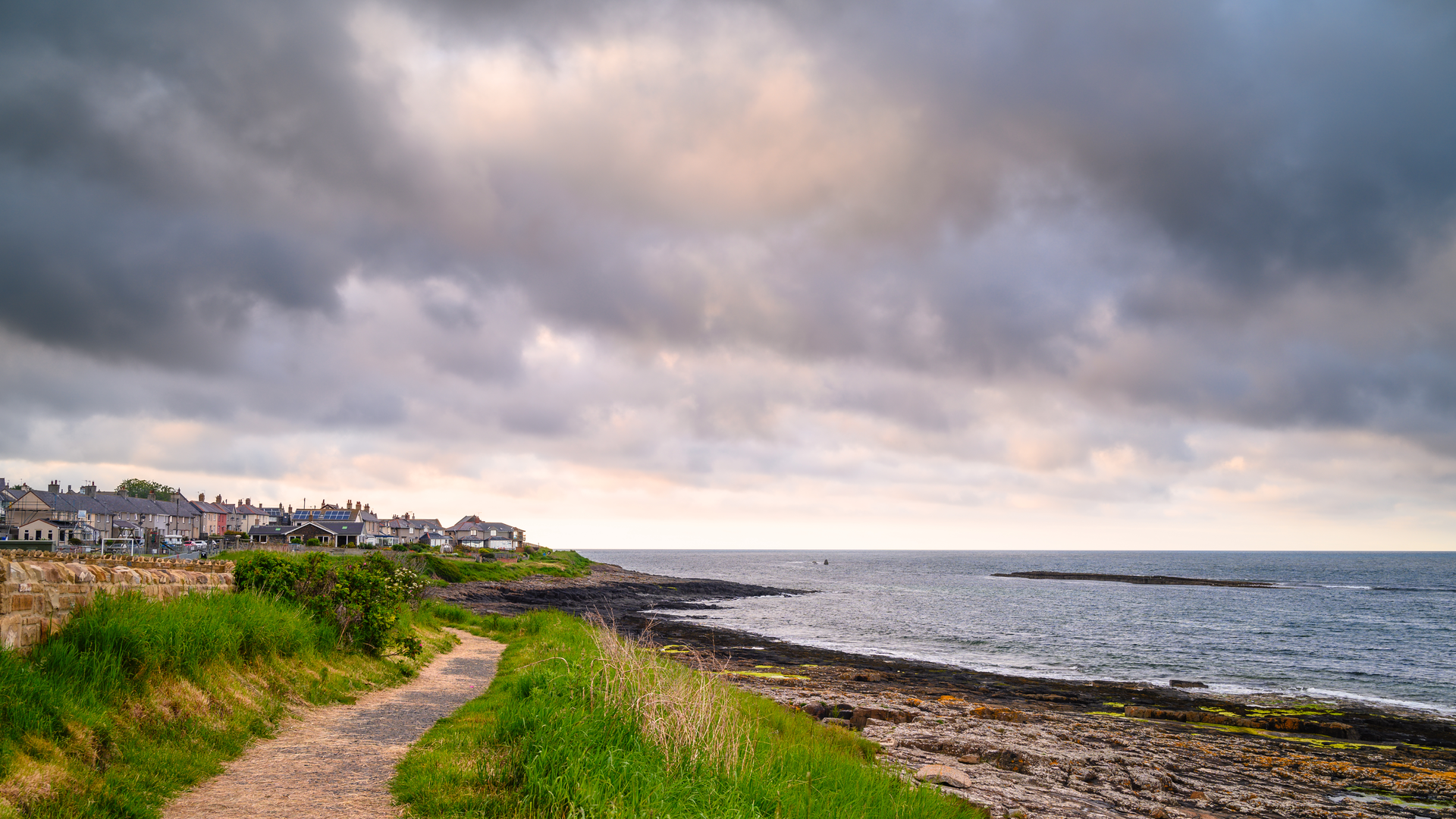 An image depicting the trail Northumberland Coast Path and its surrounding area.