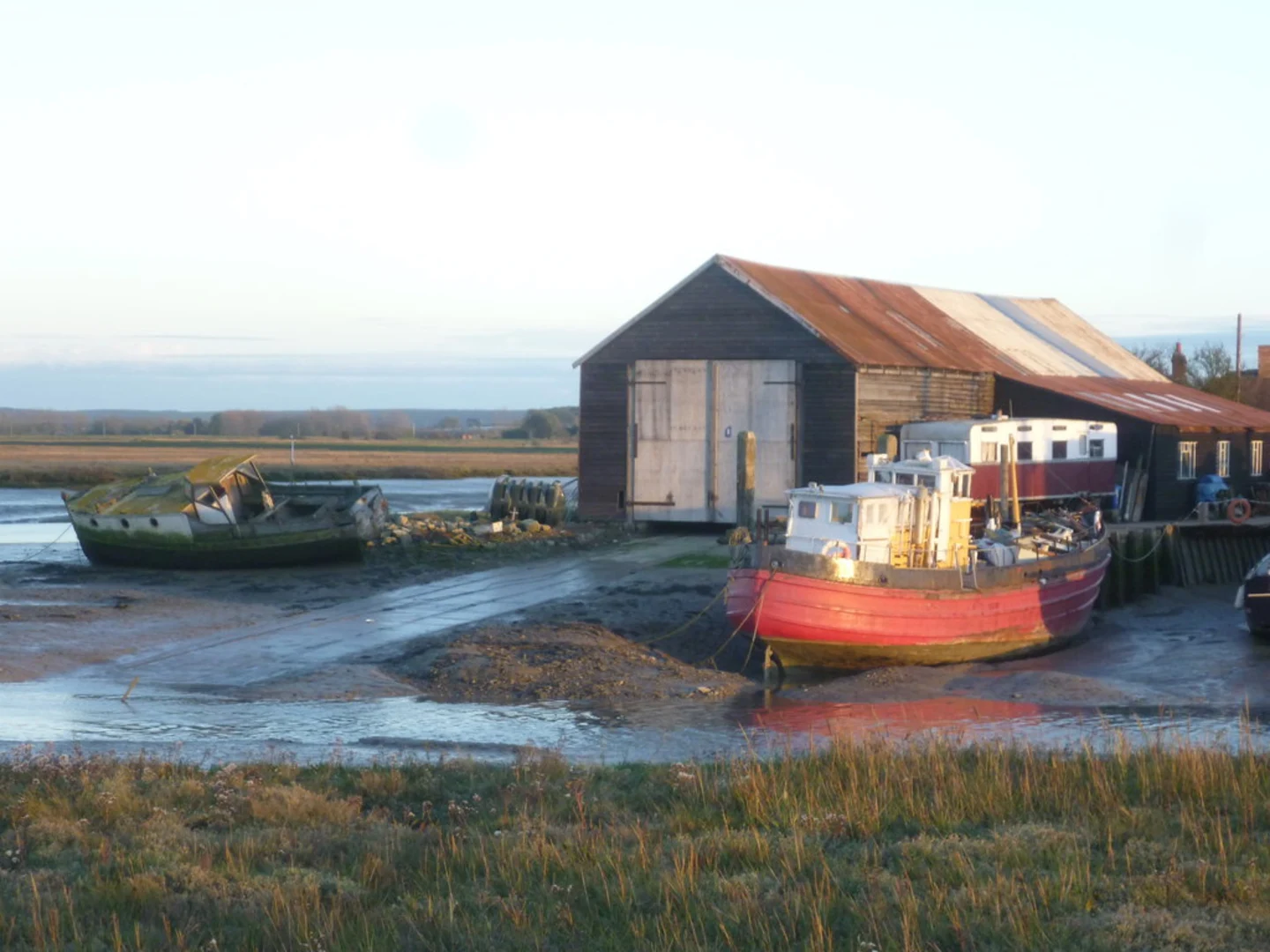An image depicting the trail Saxon Shore Way and Swale Heritage Trail and its surrounding area.