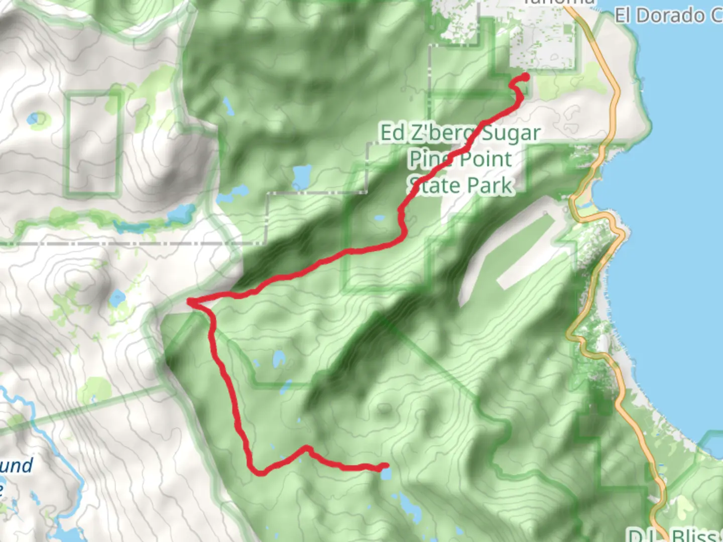 An image depicting the trail Lake Genevieve via North Fire Road and its surrounding area.